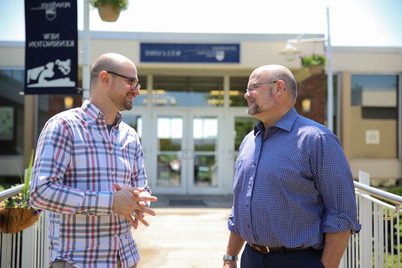 Kevin Snider, chancellor of Penn State New Kensington, speaks with Joseph Cuiffi, assistant teaching professor and program coordinator of EMET